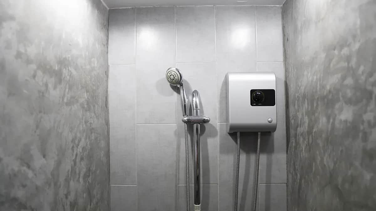 Electric shower in a tiled bathroom