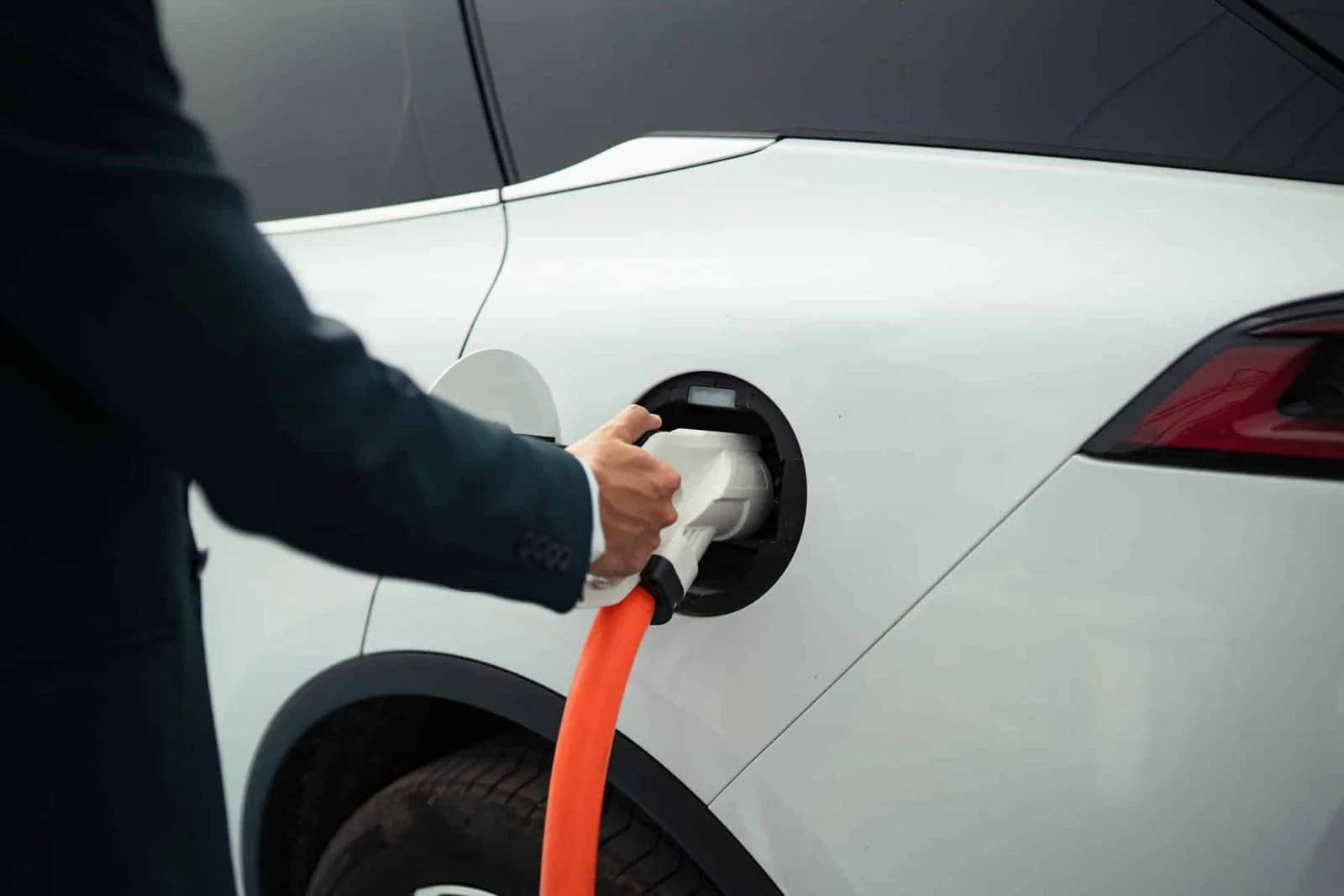 Electric vehicle connected to a charging cable