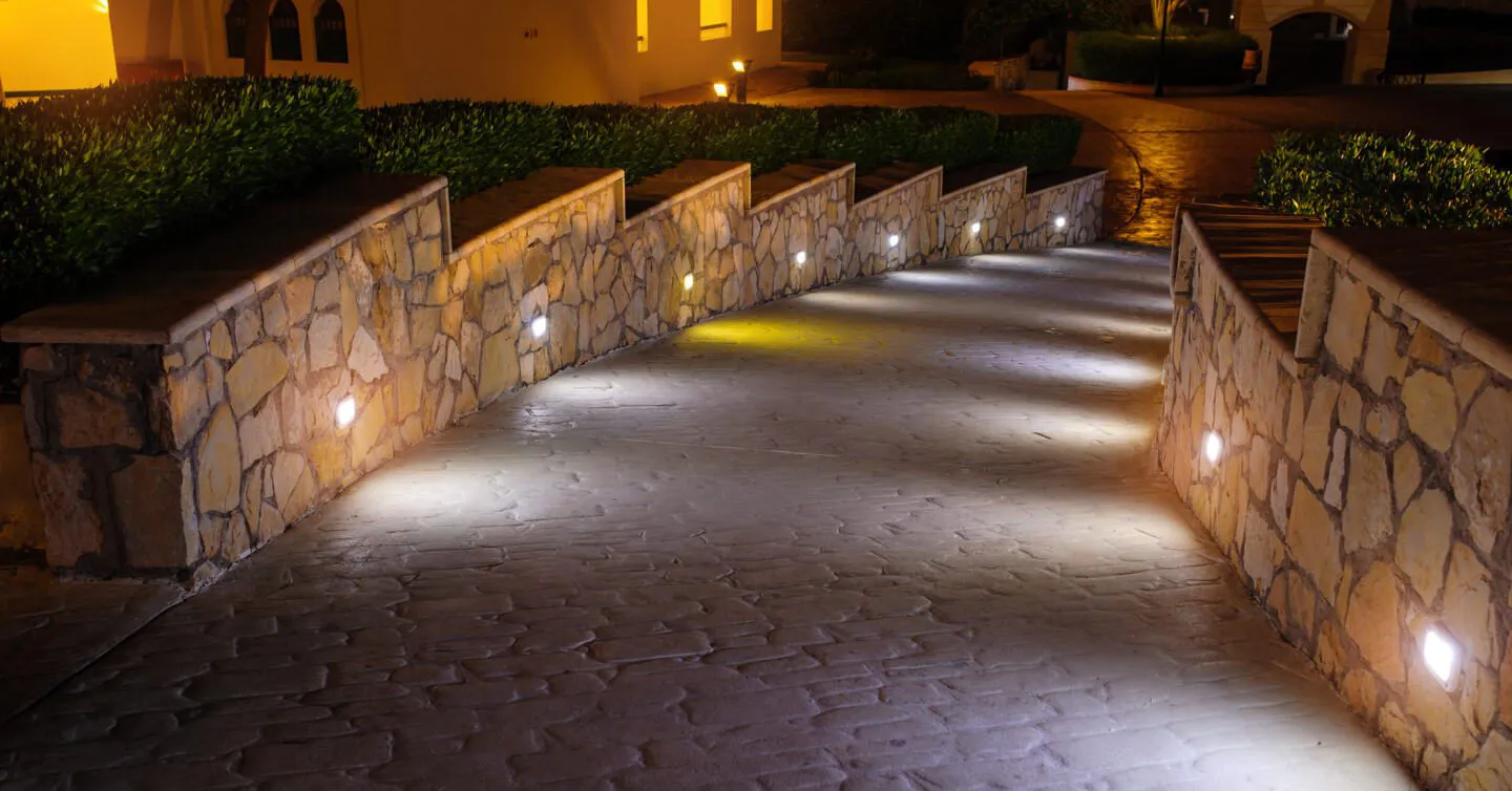 Outdoor lighting on a driveway in a modern home