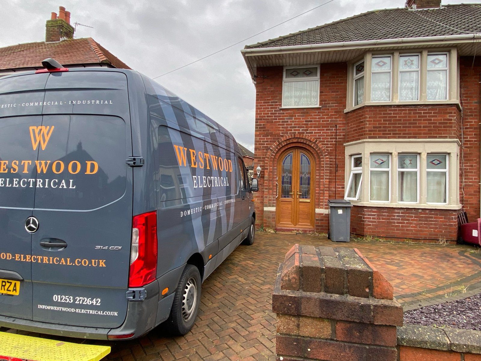 A Westwood Electrical van parked outside a customers home while they have an electrical rewire
